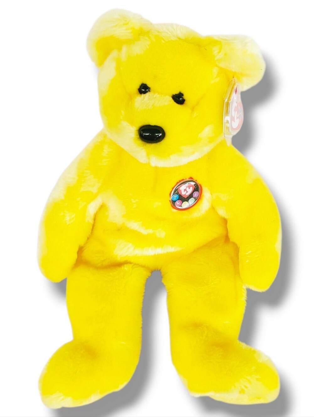 TY Beanie Baby, Tradee Yellow Bear June 29 2000 Retired Red Ribbon Plastic Badge